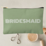 Sage Green Modern Typography Bridesmaid Accessory Pouch<br><div class="desc">Solid sage green color, small style, zippered cosmetic bag for your wedding bridesmaid that features the word, BRIDESMAID in large, modern typography on one side of bag. Perfect as a travel accessory pouch to hold makeup, perfume, and jewelry. You may personalize by adding bridesmaid name if desired to pouch. Available...</div>
