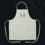 Sage Green Plaid Apron with Monogram & Name<br><div class="desc">Add a touch of elegance to everyday cooking and baking with this beautifully personalized green plaid apron. Featuring a sage green and white plaid background, this feminine design is finished with your custom initial and name in a graceful fancy script font—creating a timeless, sophisticated look that feels both stylish and...</div>