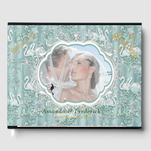 Sage green silk drapes & flamingos flowers guest book