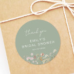 Sage Green Wildflower Thank You Bridal Shower Classic Round Sticker<br><div class="desc">Express gratitude with our Wildflower Thank You Bridal Shower In Bloom Classic Round Sticker. These charming stickers feature a delightful wildflower design, infusing a touch of natural beauty into your bridal shower thank-you notes or favors. The classic round shape adds versatility, making them perfect for various uses, from sealing envelopes...</div>