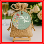 Sage Green Wildflower Wedding Thank You Favor Tags<br><div class="desc">Sage Green Wildflower Wedding Thank You Favor Tags | Rustic Botanical Floral Gift Tags Add a heartfelt, personalized touch to your wedding favors with our delightful Sage Green Wildflower Wedding Thank You Favor Tags! These exquisite tags feature delicate watercolor wildflowers and lush sage green greenery, creating a serene and sophisticated...</div>