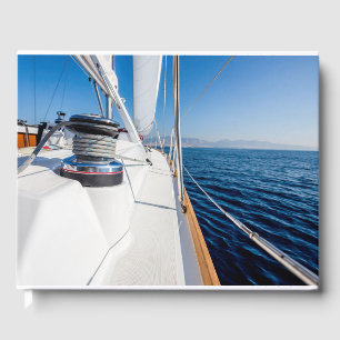 sail vessel surfing on the sea guest book