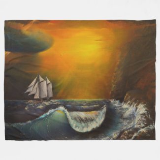 Sailboat and Sunset At The Rocky Shore