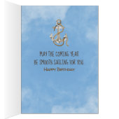 sailboat with rainbow spinnaker on water (Inside (Right))