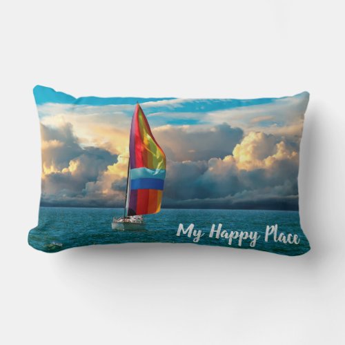 sailboat with rainbow spinnaker on water lumbar pillow