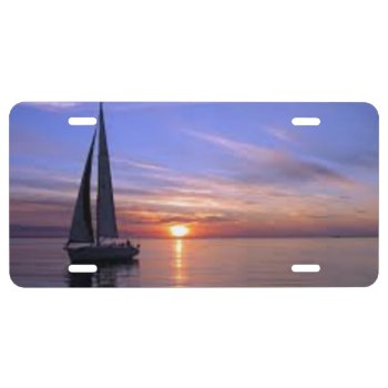 Sailing At Sunset License Plate by KraftyKays at Zazzle