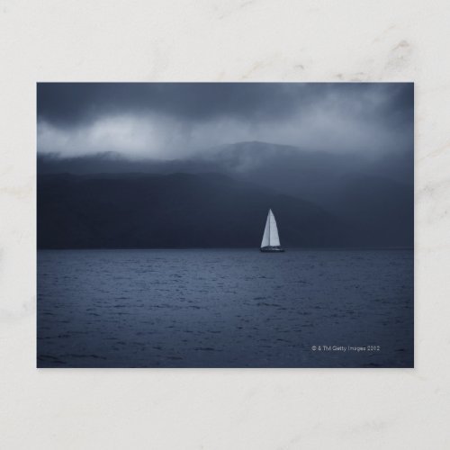 Sailing boat in stormy weather in Scottish Postcard