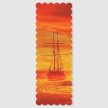 sailing ships at sunset