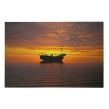 sailing ships at sunset