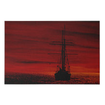 sailing ships at sunset
