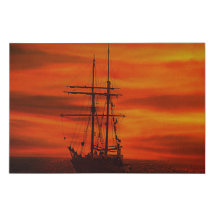 sailing ships at sunset