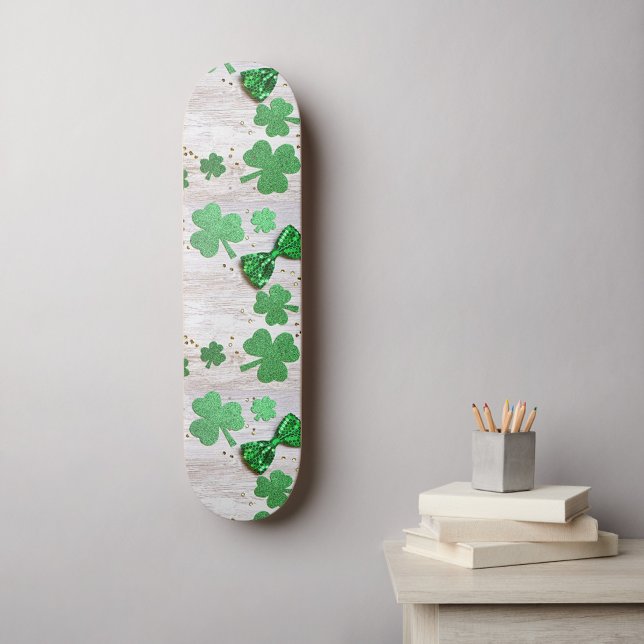 Saint Patrick Skateboard (Green clovers of different sizes  
scattered on a white background.)
