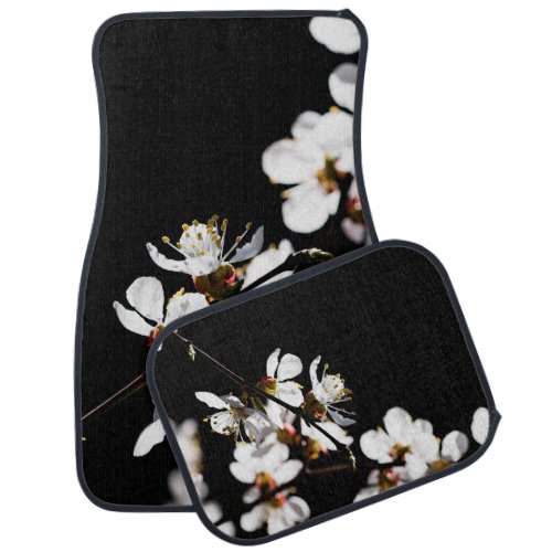 Sakura flowers on black car floor mat