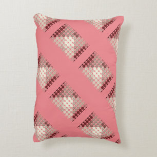 Salmon and brown circles, forming geometric shapes accent pillow