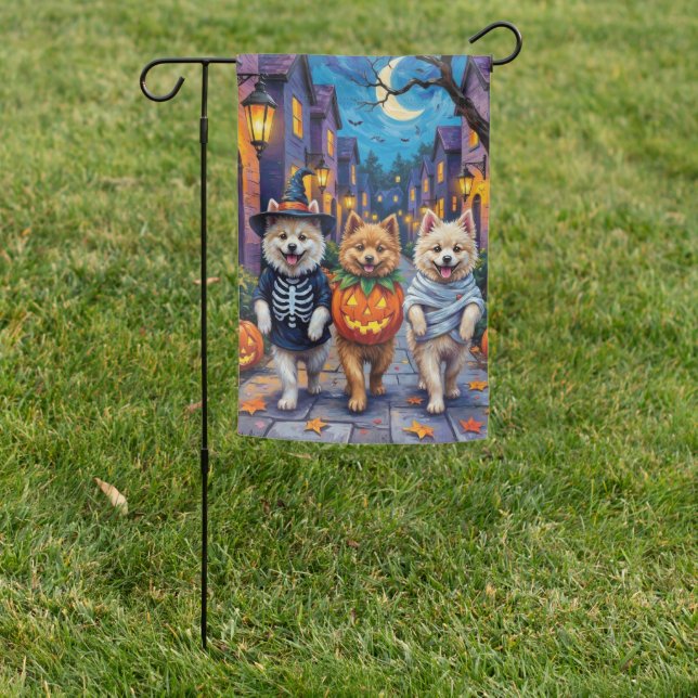 Samoyed Dogs Trick-or-Treating Halloween Costumes Garden Flag (In SItu)