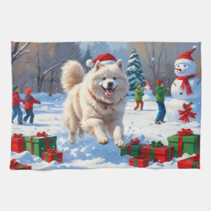 Samoyed Running in Snow with Christmas Hat Kitchen Towel