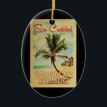 San Cristobal Palm Tree Vintage Travel Ceramic Ornament<br><div class="desc">A uniquely retro mid-century modern San Cristobal Dominican Republic art print in vintage travel poster style. It features a curved palm tree on sandy beach with ocean under a blue cloudy sky.</div>