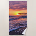 San Diego Pacific Beach Pier Sunset Beach Towel<br><div class="desc">San Diego Pacific Beach Pier Sunset Beach Towel (purple, orange, pink)... The sun is at the end of the Crystal Pier, in Pacific Beach, San Diego, California, USA, with a beautiful foamy wave in the foreground, and the orange-purple ombre sky reflects on the wet sand and ocean water. This photograph...</div>