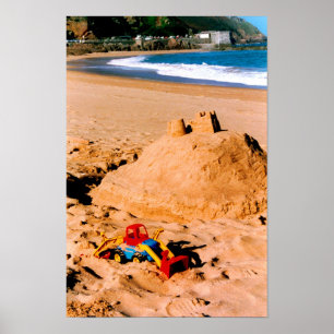 Sand castle and beach poster
