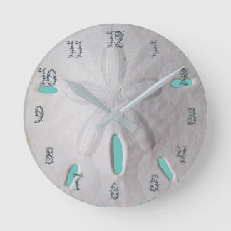 Sand dollar ocean beach white turquoise round clock