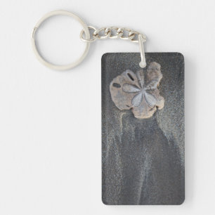 Sand dollar on sand keychain