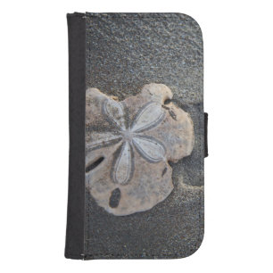 Sand dollar on sand phone wallet