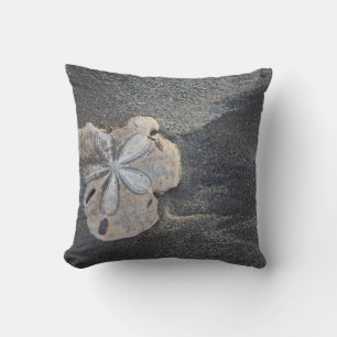 Sand dollar on sand throw pillow