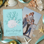 Sand Dollar Starfish Seas & Greetings Christmas Holiday Card<br><div class="desc">This beach inspired Christmas card features a white sand dollar and 2 white starfish on glitter coral,  with an aqua blue background,  and “Seas & Greetings” in a trendy handwriting script font. On the back is a photo template.</div>