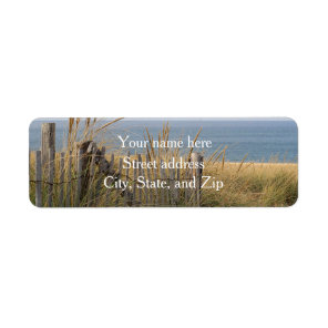 Sand dunes and beach fence label