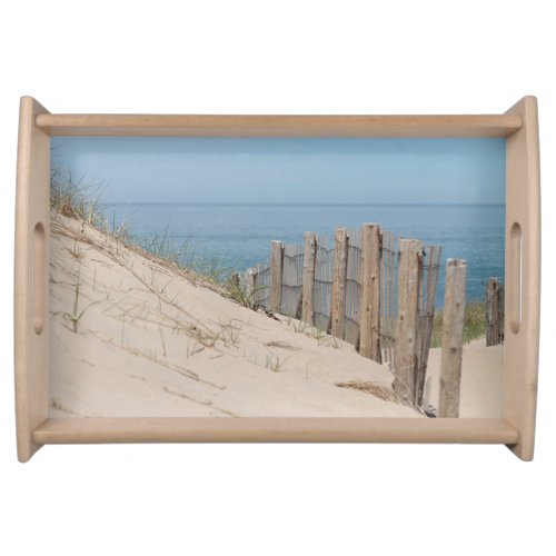 Sand dunes and weathered beach fence serving tray