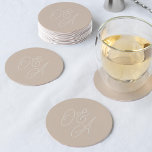 Sand | Oversized Script Monogram Wedding Round Paper Coaster<br><div class="desc">A beautiful typography based wedding coaster featuring your initials in oversized script lettering. Our Sand colorway is an elegant mix of earth tone shades,  with pale cream lettering on a soft sandy beige background.</div>