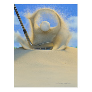 sand wedge hitting a golf ball out of a sand 2 postcard