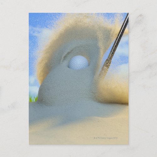 sand wedge hitting a golf ball out of a sand postcard