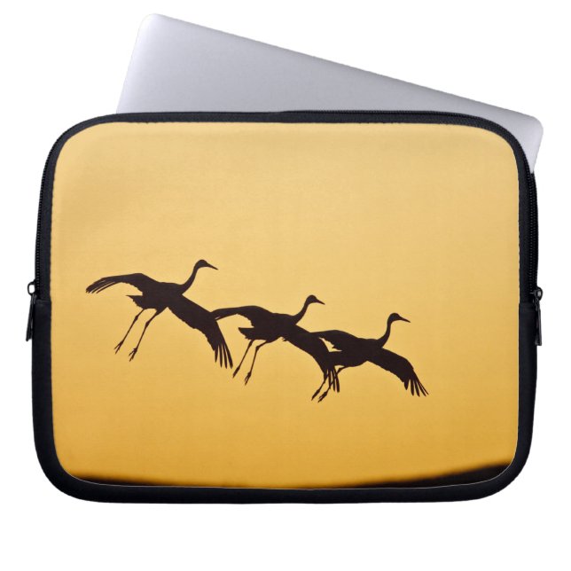 Sandhill Crane landing at sunset Laptop Sleeve (Front)