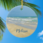 Sandpiper on the Seashore | Beautiful Beach Custom Ceramic Ornament<br><div class="desc">Beautiful beach ornament with gorgeous seaside photography featuring a pretty sandpiper standing at the edge of the ocean waves on a sunny summer day. Lovely blue green water waves roll onto the sandy shore where your name is personalized in cute teal typography. A beautiful Christmas gift for a daughter, mom,...</div>