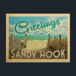 Sandy Hook Beach Vintage Travel Postcard<br><div class="desc">This Greetings From Sandy Hook vintage postcard design features a sandy beach with a beautiful turquoise ocean water and above the sea,  a blue sky with billowy white clouds. In vintage travels style.</div>