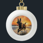 Sandy Paws Belgian Malinois Dog on Beach Sunset  Ceramic Ball Christmas Ornament<br><div class="desc">Immerse yourself in the tranquil beauty of our "Sandy Paws and Sunset Hues" dog on beach sunset design. This captivating scene captures the essence of a perfect evening at the shore, with a loyal canine companion enjoying the golden sands and the breathtaking hues of the setting sun. Whether you're a...</div>
