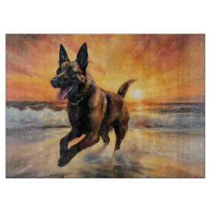 Sandy Paws Belgian Malinois Dog on Beach Sunset Cutting Board