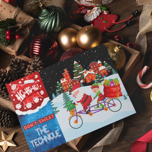 Santa and Elfâs Snowy Bike Ride Holiday Postcard