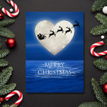 Santa and Heart Full Moon Beach Christmas Holiday Card<br><div class="desc">This Merry Christmas holiday greeting card features a heart shaped full moon with Santa and his sleigh above a moon lit body of water.  Inside Greeting ~ "Wishing You a Magical Holiday Season".  The greeting can be personalized to read as you wish.  ^</div>