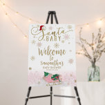 Santa Baby Christmas Girl Baby Shower Welcome Sign<br><div class="desc">Adorable calligraphy with snowflakes,  winter-themed baby shower welcome sign. Easy to personalize with your details. Check the collection to find matching items as enclosure cards.</div>