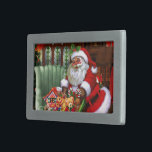 Santa Claus 2 Belt Buckle<br><div class="desc">A cute Santa Claus is coming with a fully packed bag with gifts and a christmas tree! Click on Customize to personalized the gift product! Artwork by GraphicMarket!</div>