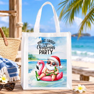 Santa Claus at beach for Christmas in July Grocery Bag