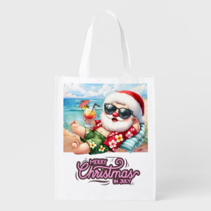 Santa Claus at beach for Christmas in July Grocery Bag