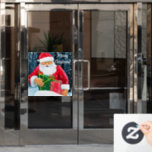 Santa Claus at Christmas in  the snow Window Cling