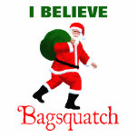 Santa Claus - Bagsquatch Cutout<br><div class="desc">Do you believe in Santa Claus? An image of Santa Claus along the lines of the striding Sasquatch from the Patterson-Gimlin film. Text reading "Bagsquatch" also appears along with customizable text reading "I BELIEVE." Bagsquatch, aka Bigbag, is an elusive, nocturnal figure generally only seen on one night in late December....</div>