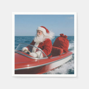 Santa Claus Delivering Gifts By Speedboat Napkins