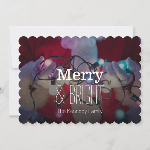 Santa Claus holding colored Christmas lights Holiday Card