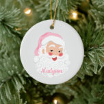 Santa Claus in Pink Hat Vintage Christmas Ceramic Ornament<br><div class="desc">This Christmas ornament is ready to be personalized with your own name and an additional message on the reverse side. It features a vintage style illustration of a jolly Santa Claus face wearing a pink Santa hat set against a light gray background.</div>