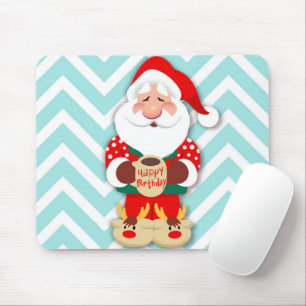 Santa claus in red pajamas holding a mug mouse pad